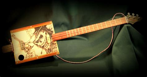 cigar box guitar electric skulls|Cigar box style 4 string skull guitar .